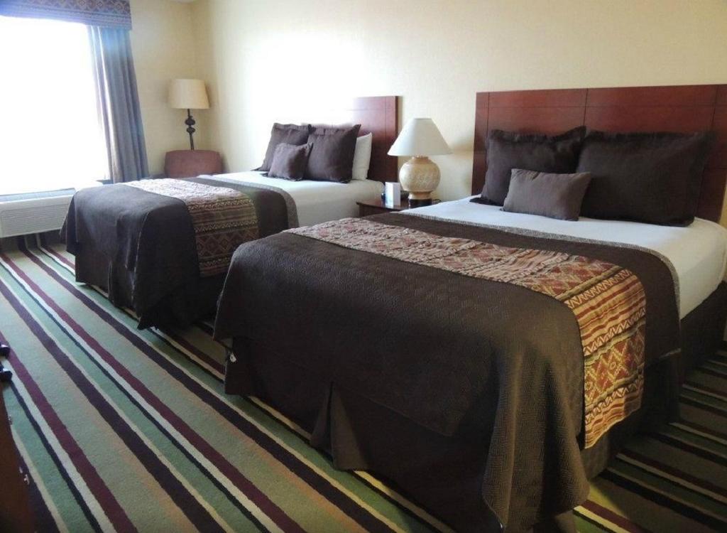 摩恩科皮传统套房酒店 图巴城 客房 照片